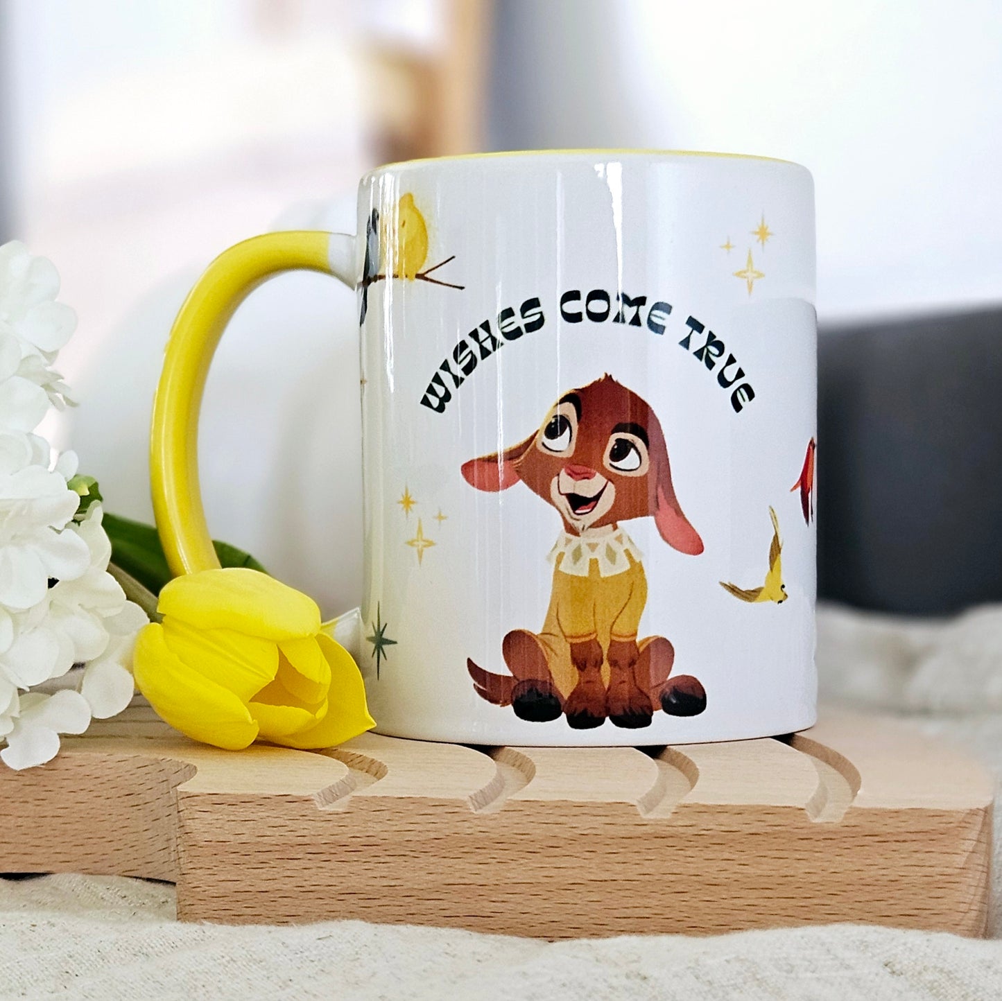 Disney wish valentino movie mug with illustrations and yellow handle