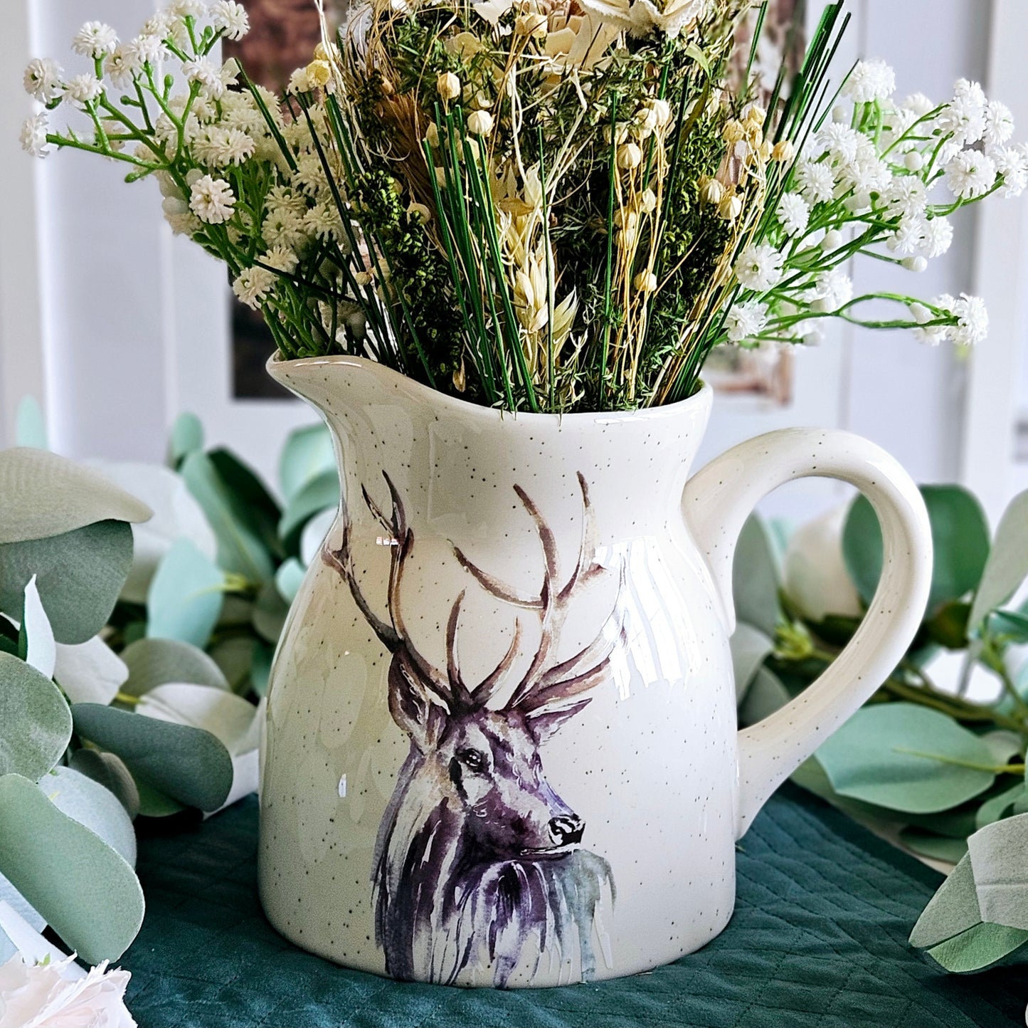 Meg Hawkins stag jug with stag illustration and speckled finish