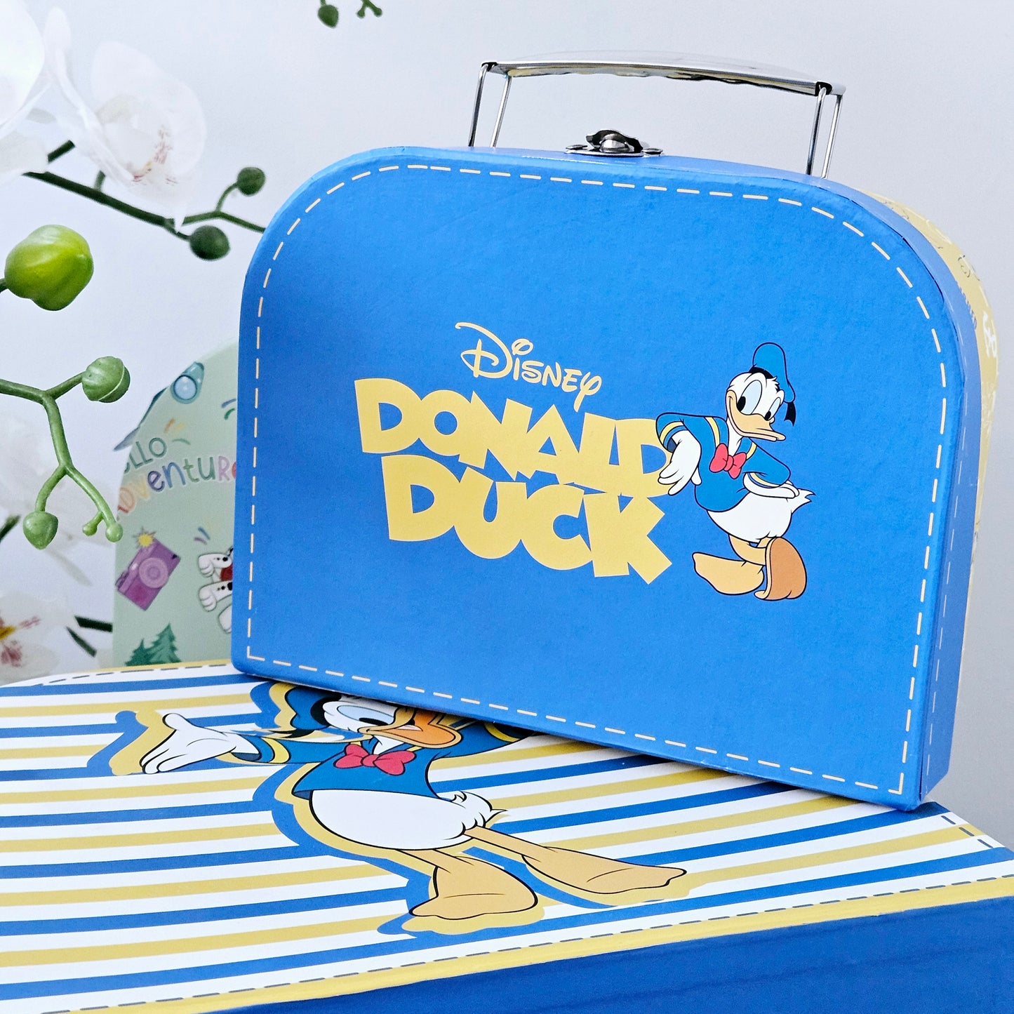 Donald Duck set of 2 suitcases with smaller on inside the larger one. blue yellow and white colours