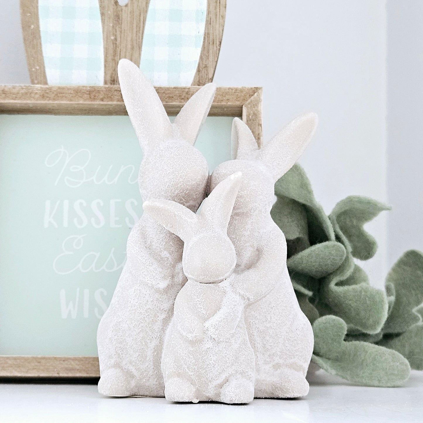 family of ceramic bunnies ornament in white