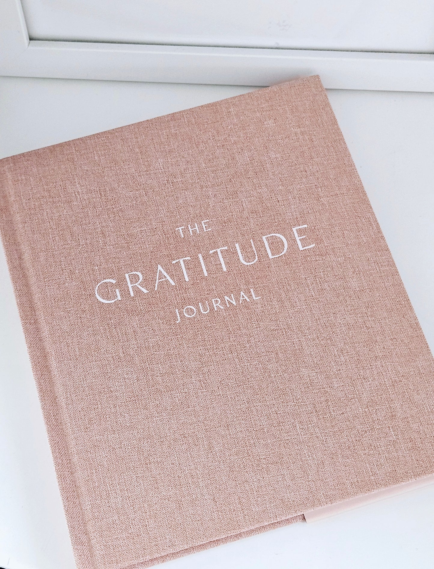 gratitude journal by Sophia in a dusty pink hardback journal