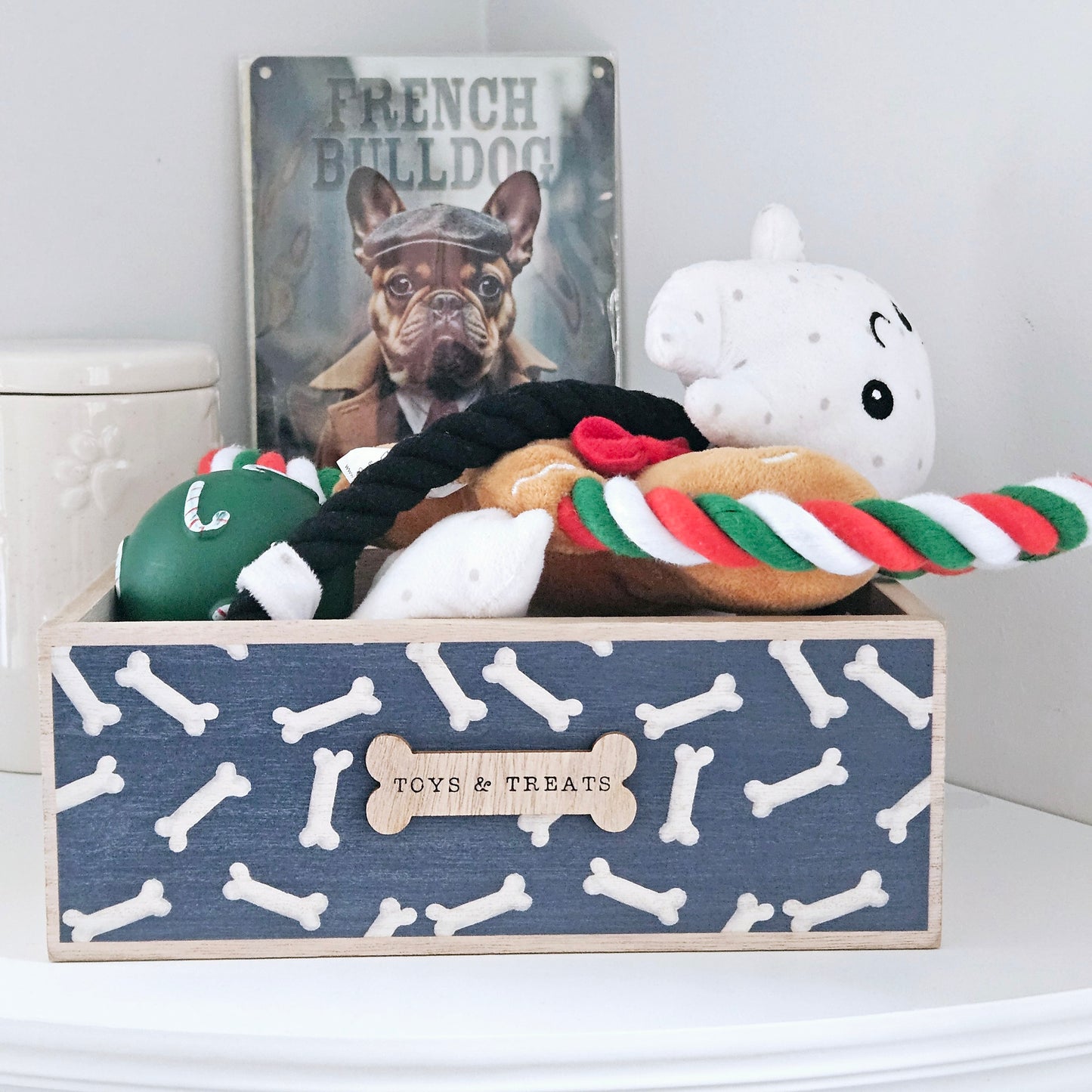 wooden toys and treats blue and white pet crate storage