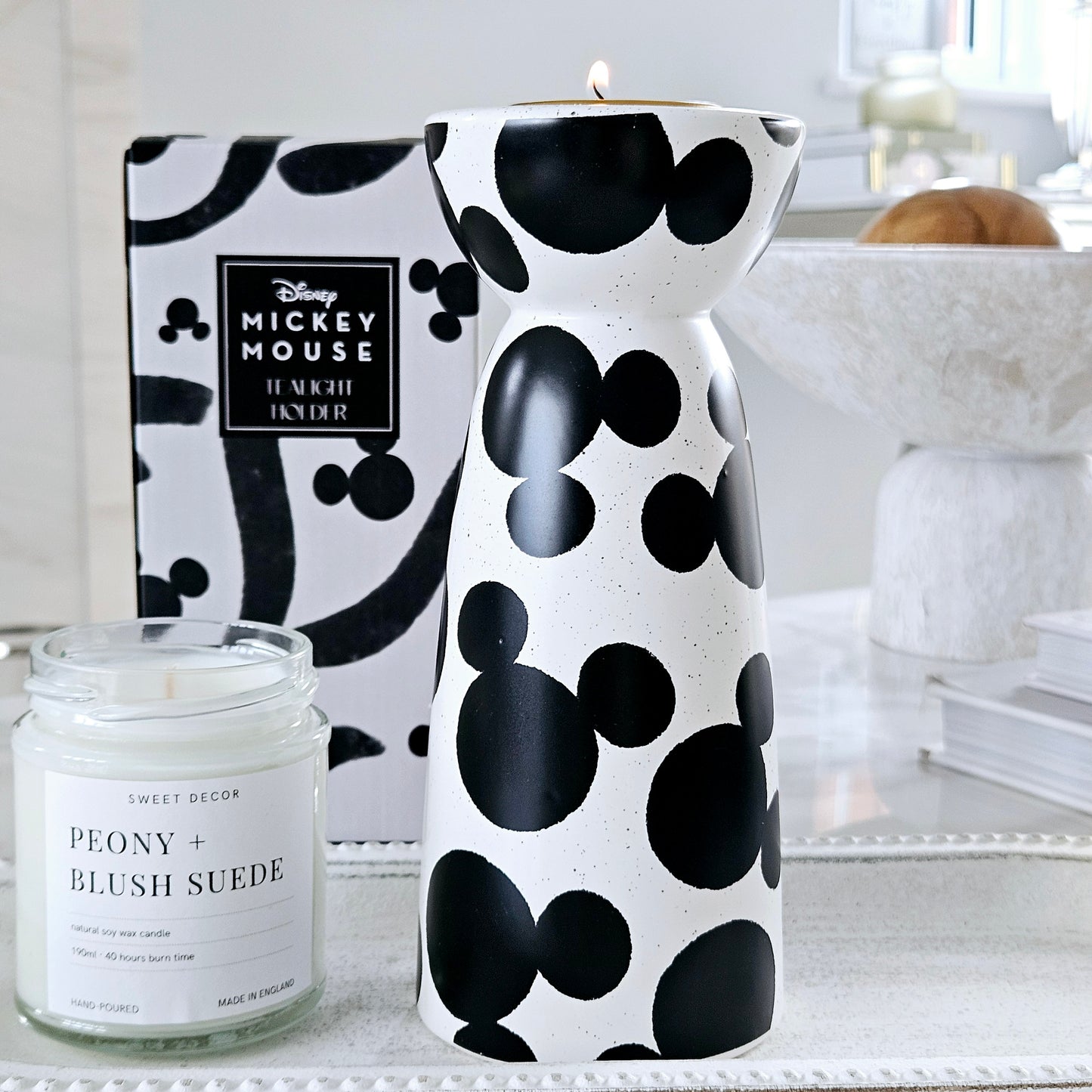 A Disney Mickey Shapes Tealight Holder. Made from ceramic with speckled finish in white and black