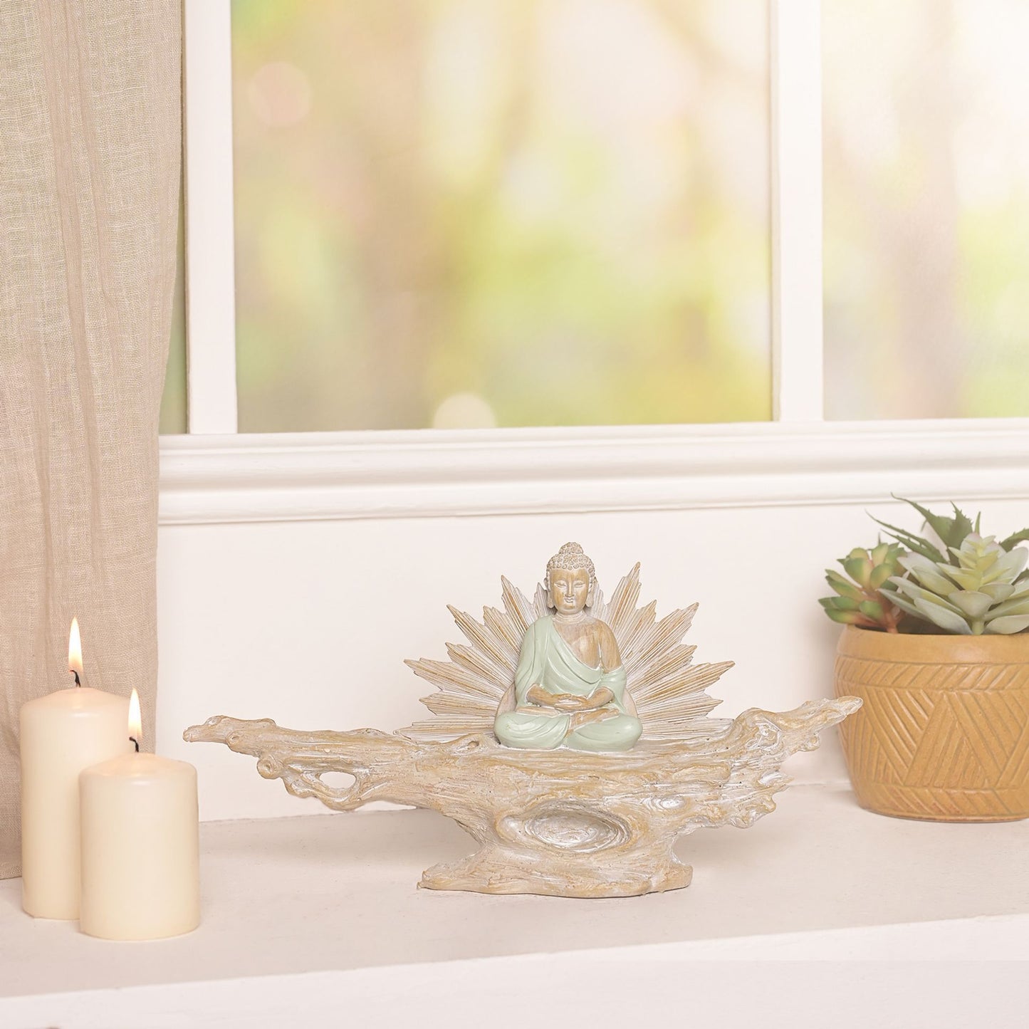 Juliana meditating buddha on a branch ornament