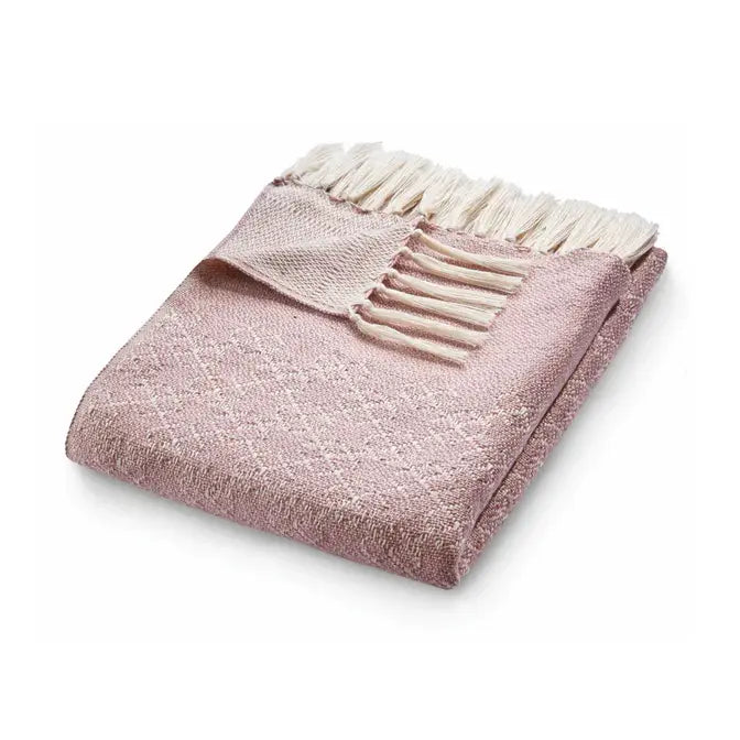 woven trellis rose coloured throw with white tassels
