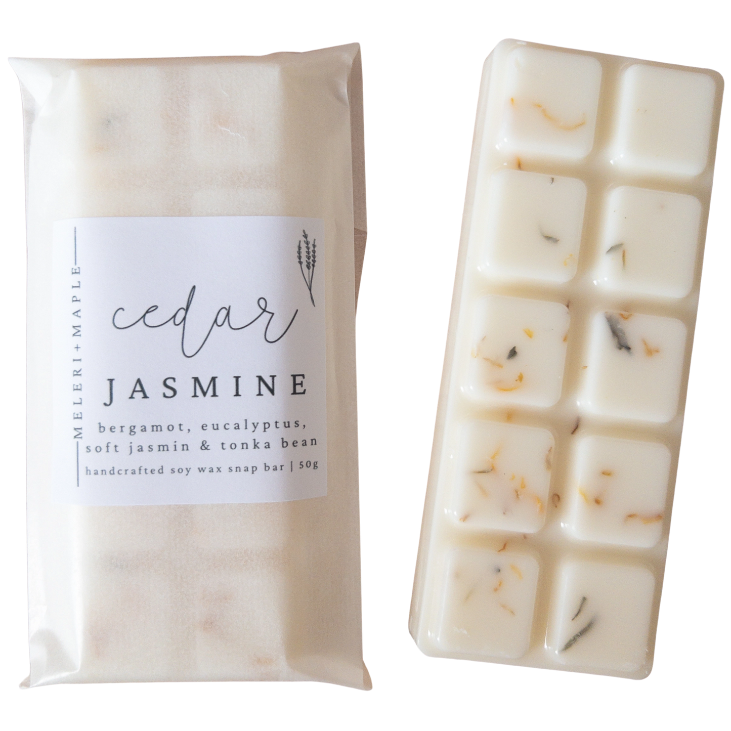Packaged wax melt snap bar labeled 'cedar jasmine' next to an unwrapped soap bar with visible ingredients.