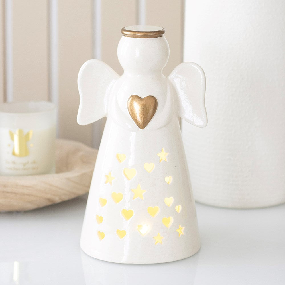 Large ceramic LED light up angel with metallic gold heart and halo for Christmas home decor
