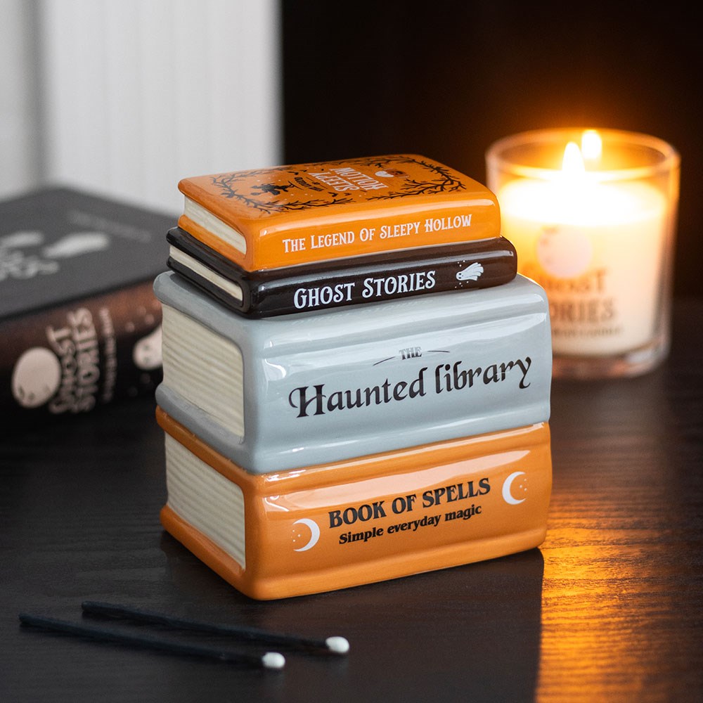 Stack of book-shaped ceramic wax warmer and oil burner haunted decorative