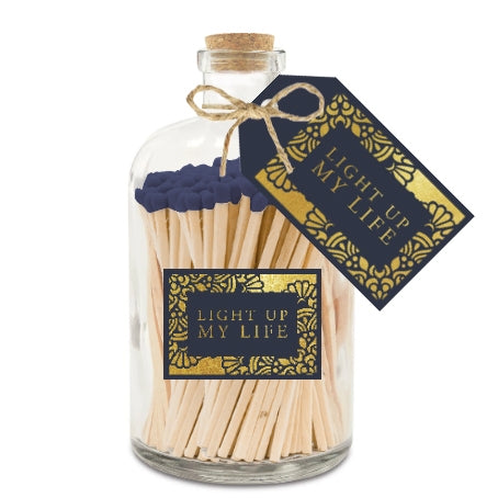 Matches With a Navy Top In a Glass Jar With "Light Up My Life" Text On Front And Tag Around The Neck. With a Cork Stopper