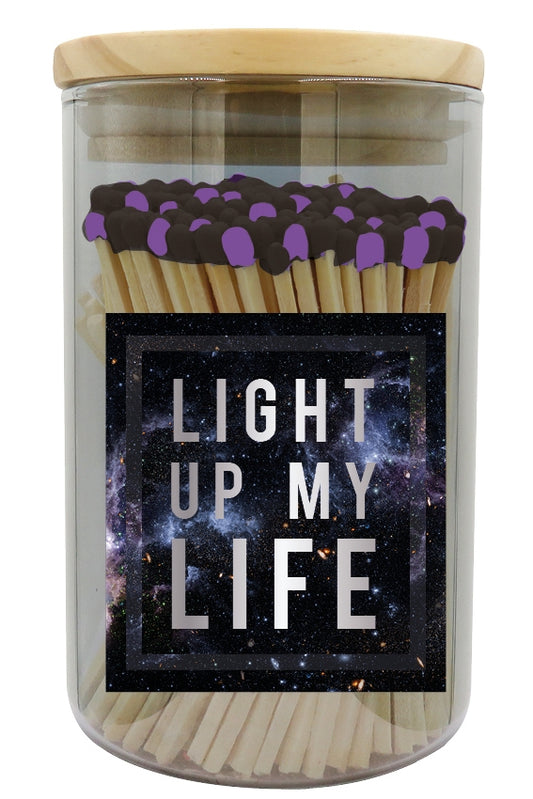 Matches With a Black & Purple Top In a Glass Jar With "Light Up My Life" Text On Label 