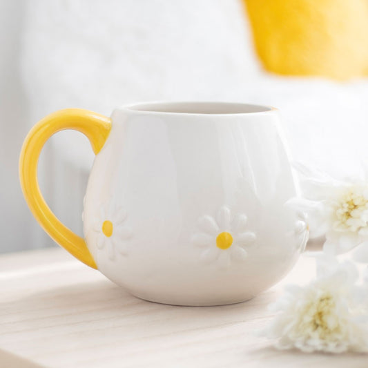 Daisy rounded mug with daisies and a yellow handle