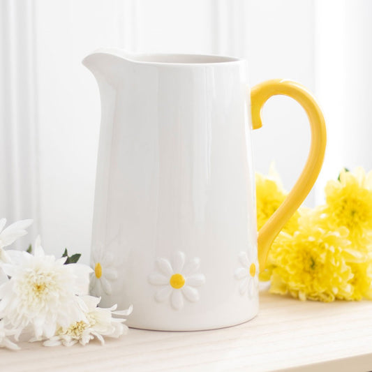 Ceramic flower daisy embossed jug with yellow handle