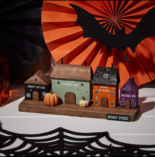 halloween spooky street block with bats and pumpkin houses