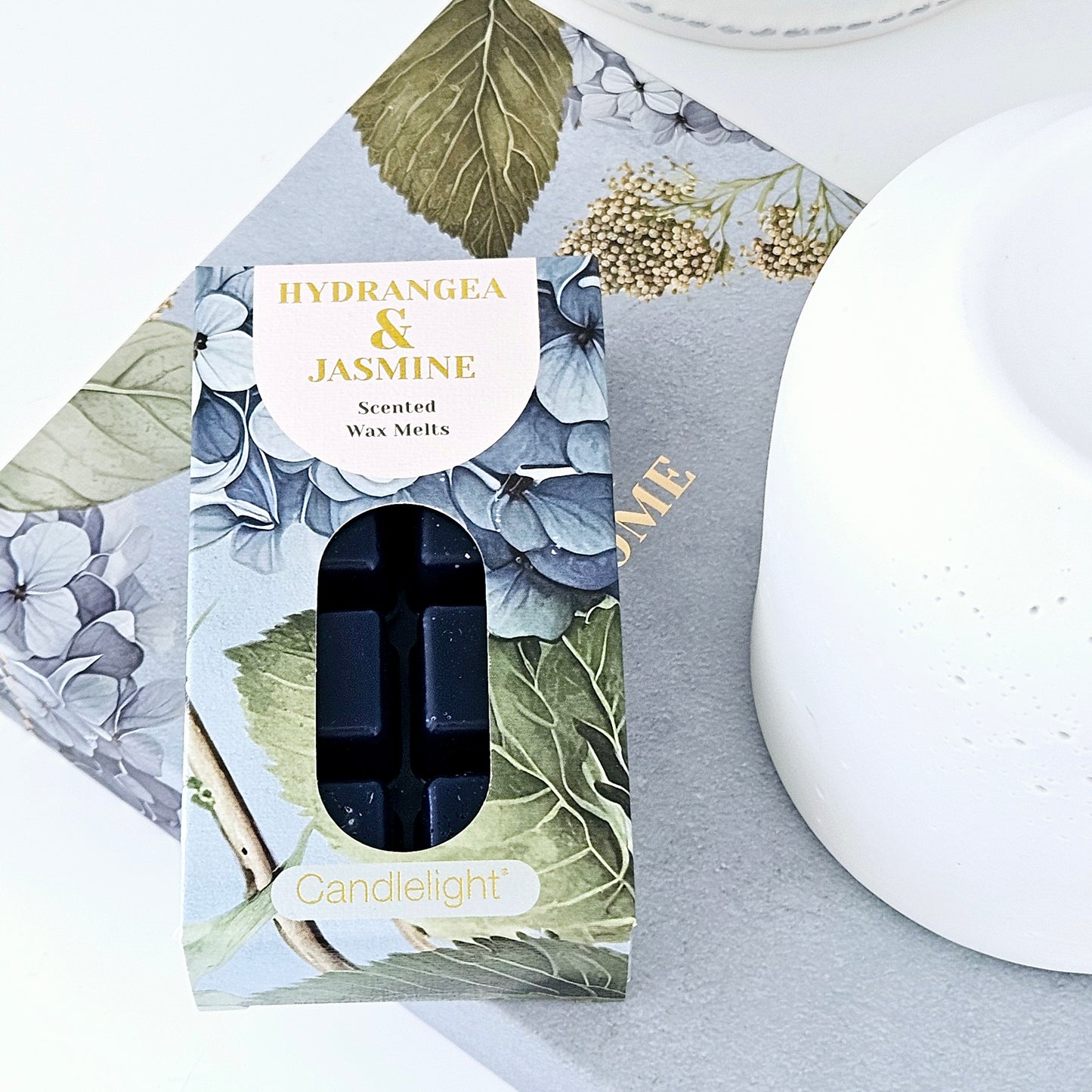 hydrangea and jasmine scented wax melts in blue packaging