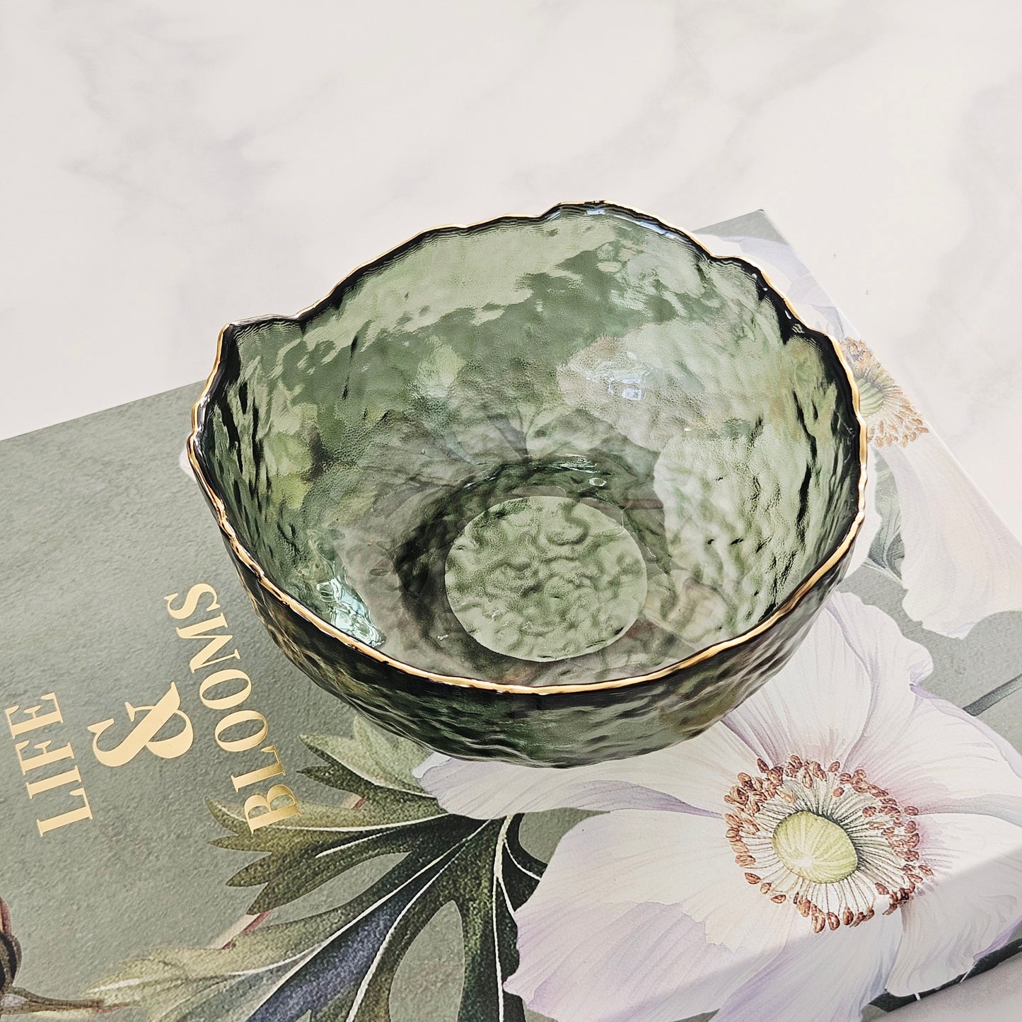 small Green glass bowl with a gold rim with wavy details 13cm