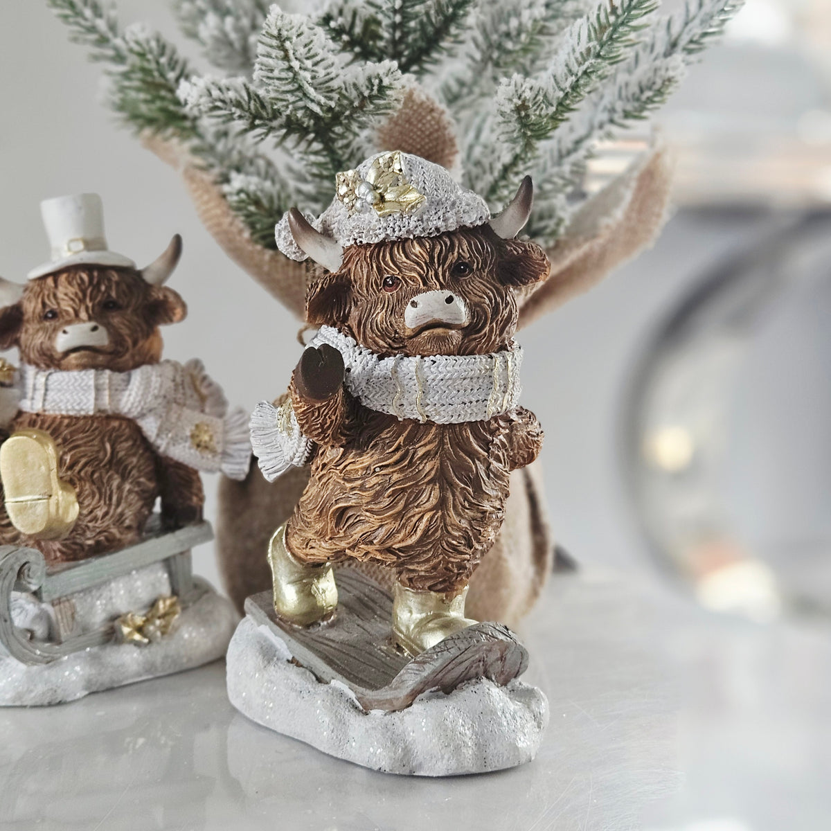 Christmas Highland Cow on Sledge Decoration β 16cm