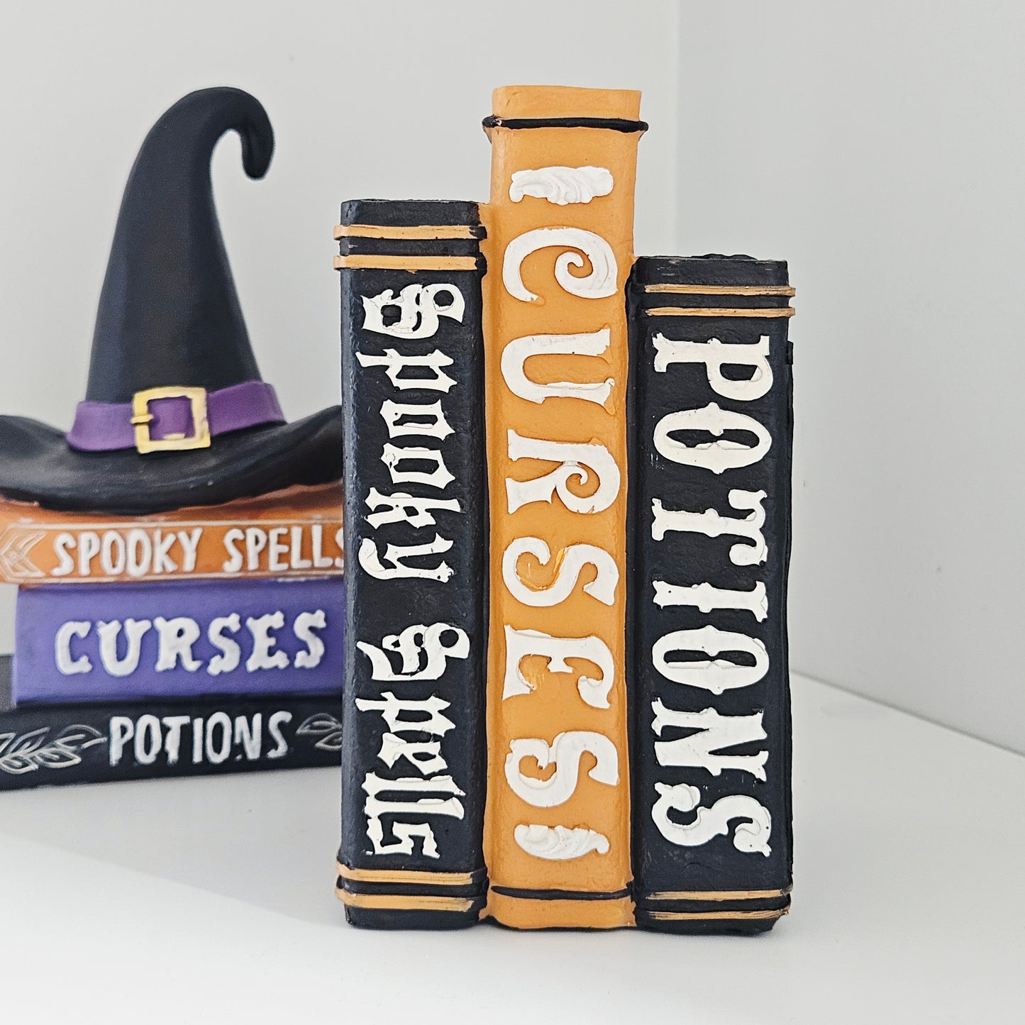 Decorative books with Halloween-themed text
