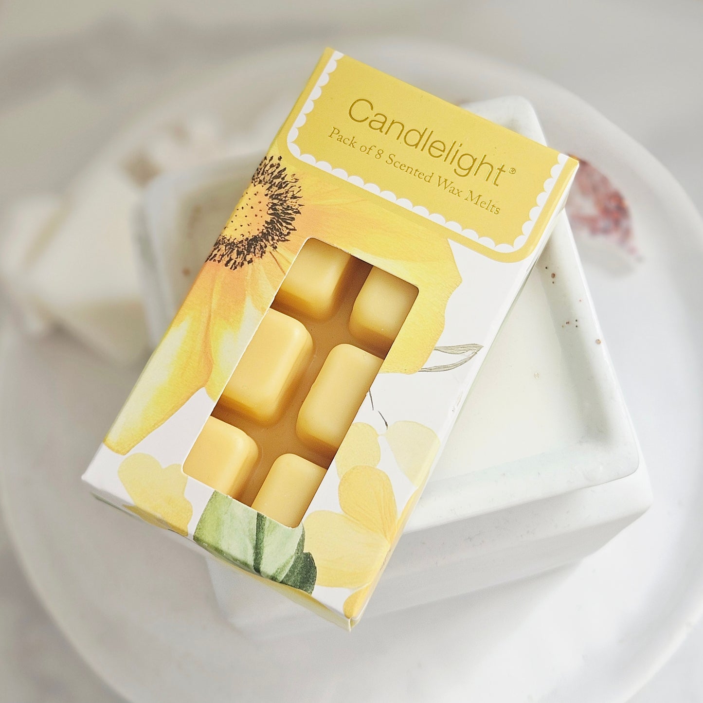 Box of sunflower-patterned box wax melts in yellow