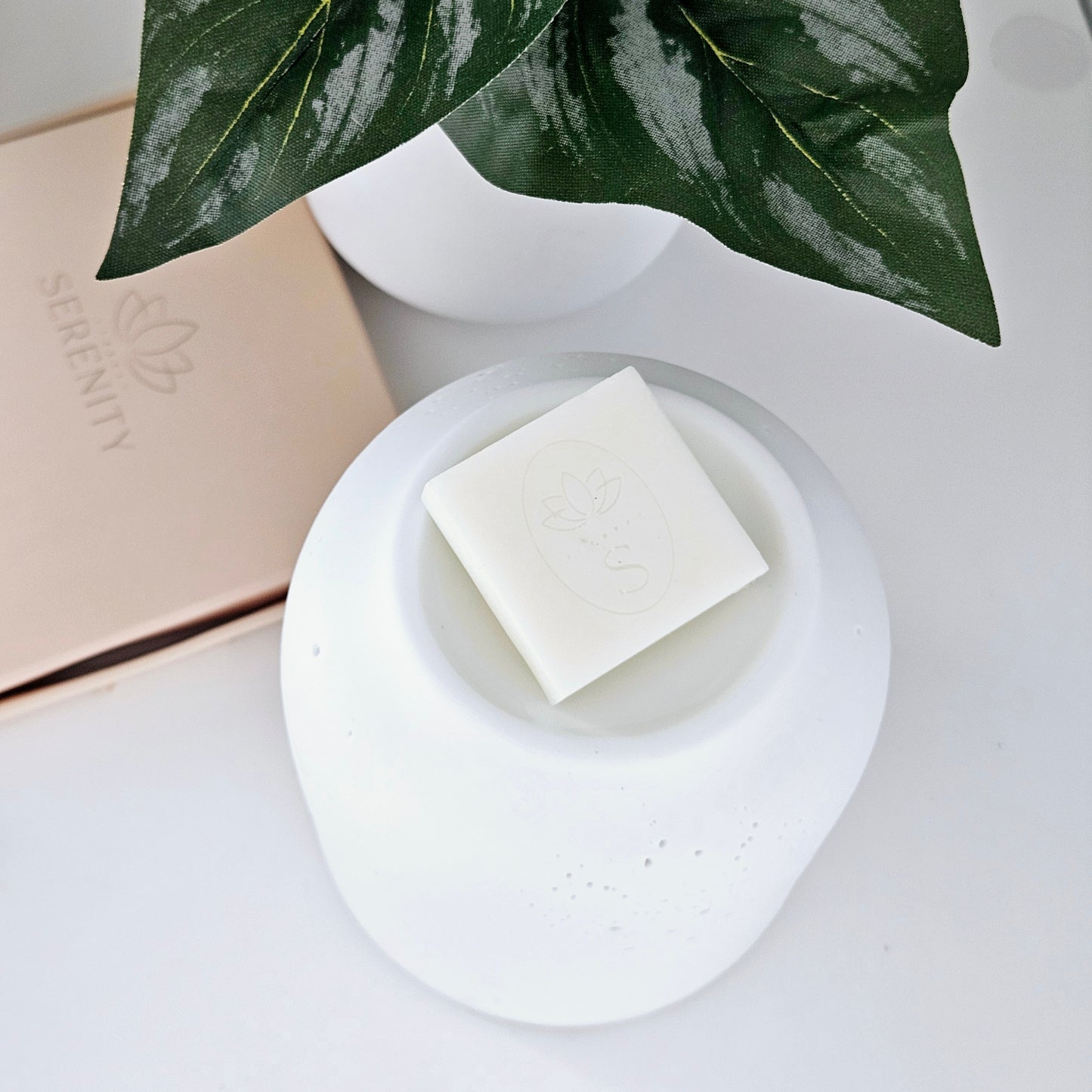 white pin holed ceramic wax and oil burner by hestia