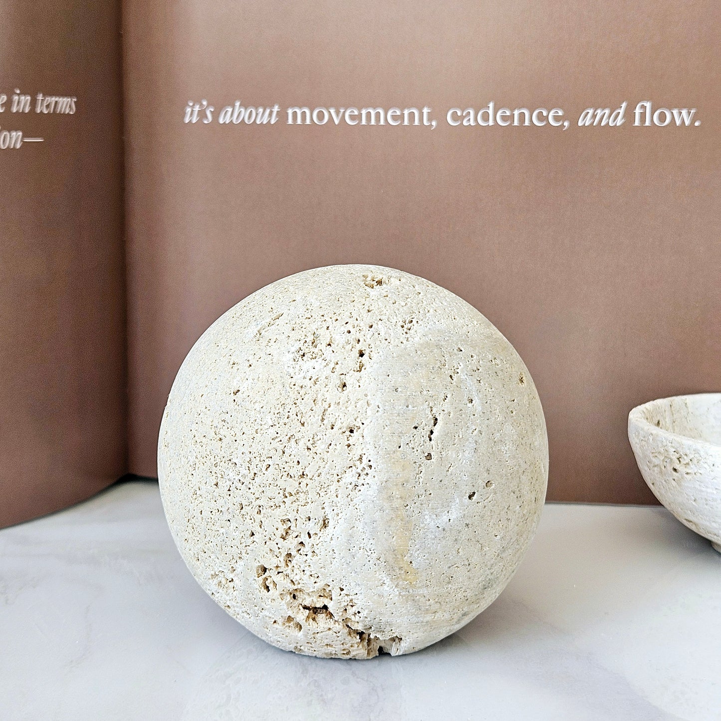 earthy tones with rough feel hestia travertine sphere 10cm decorative ornament.