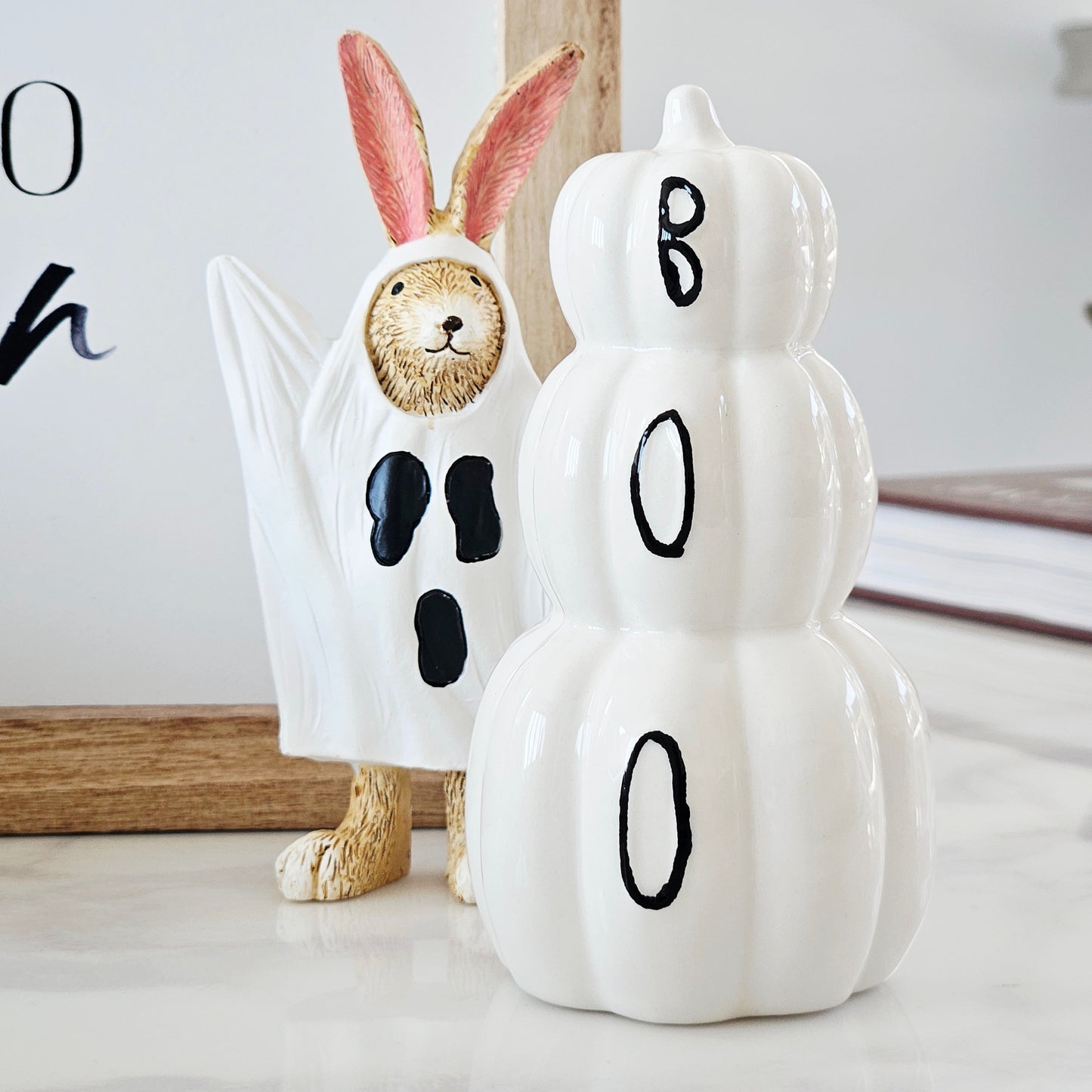 decorative ceramic Halloween pumpkin stack with Boo word written in black