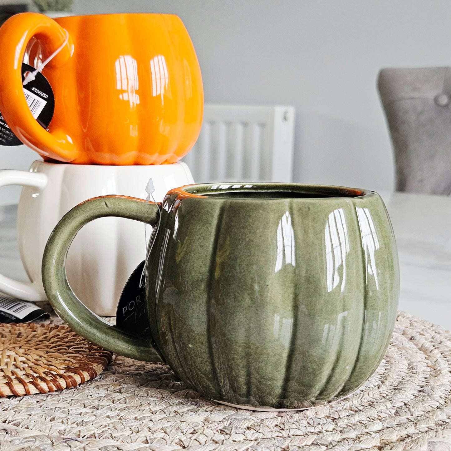 Green ceramic pumpkin mug with ribbed texture