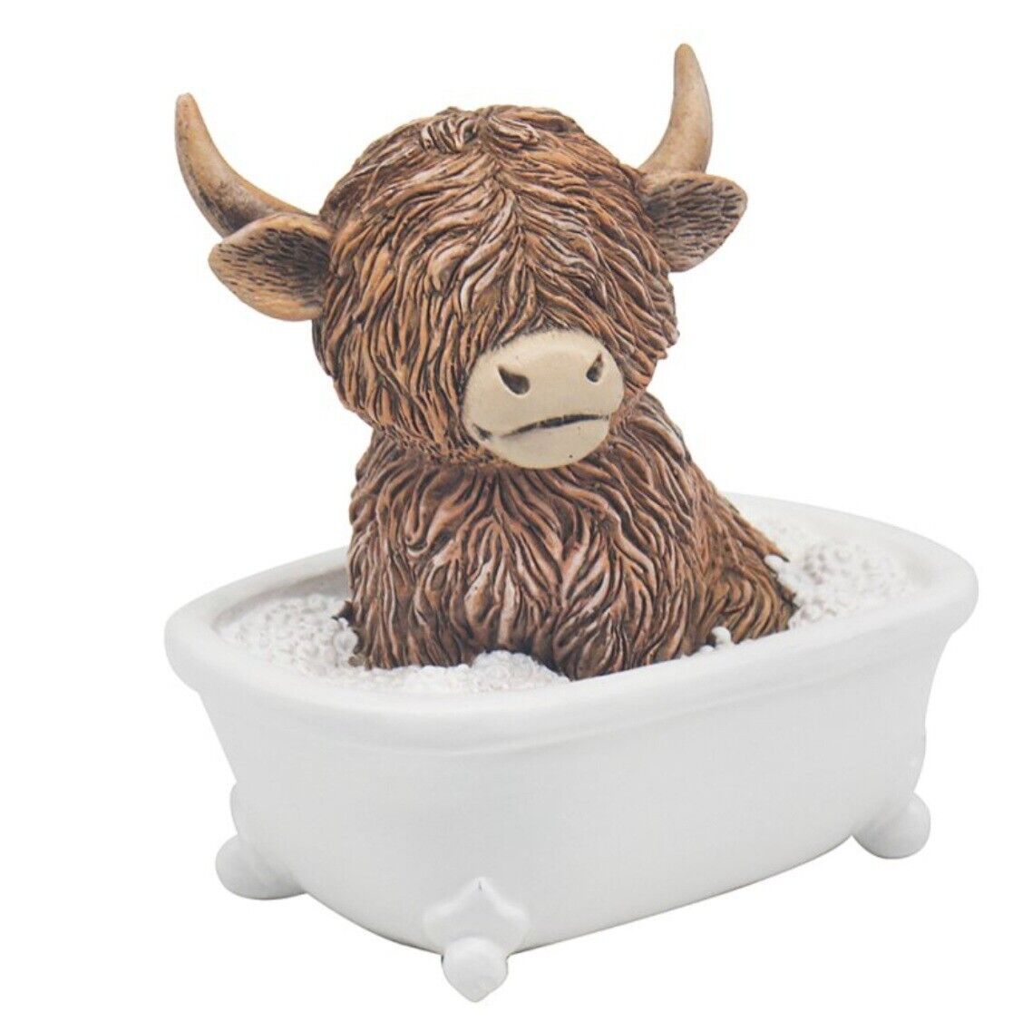 Highland cow ornament sitting in a bath tub with bubbles