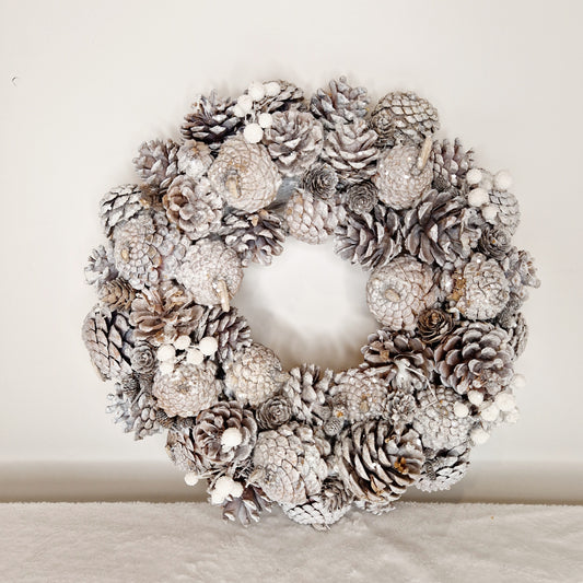 Silver Pinecone Wreath made with a Mixture of Faux and Natural Materials, and String Hanger.