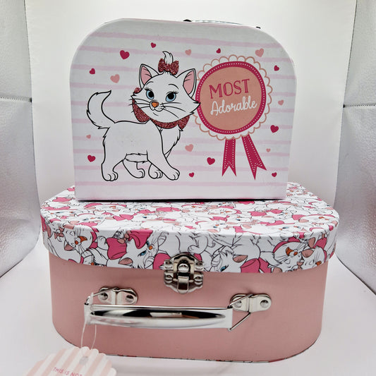 Pink glitter, pink patterns and the Aristocats' lovable heroine mini suitcases 