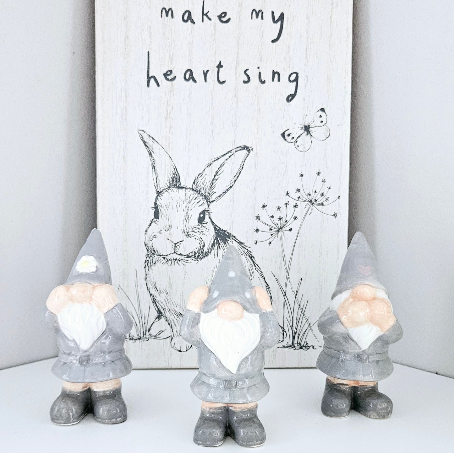 ceramic grey and white gonk trio see hear speak no evil ornament set