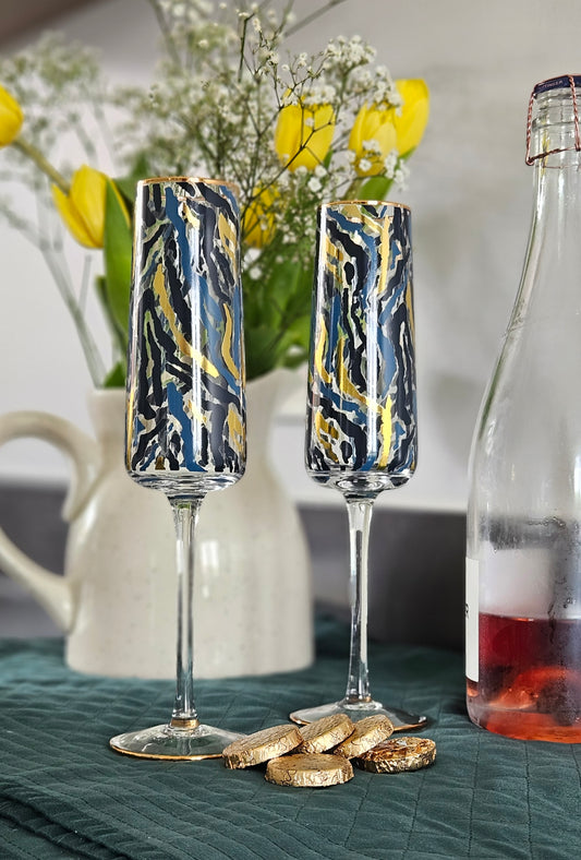 Frida set 0f 2 zebra print champagne flute glasses with blue and gold design in a gift box 