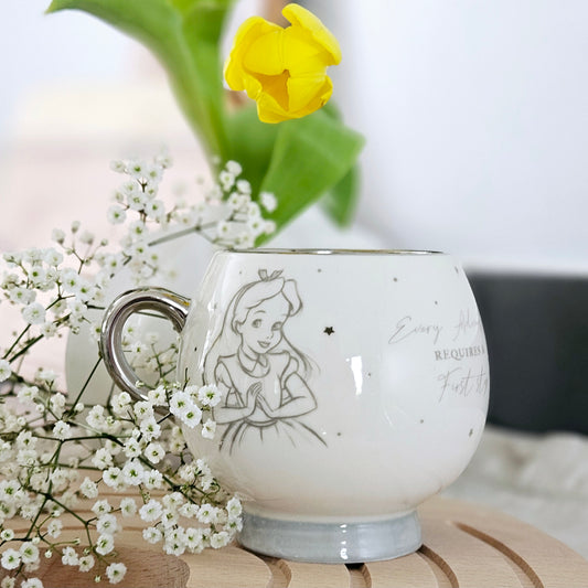 Alice in the wonderland disney 100 premium collectors mug with Alice illustration and silver handle