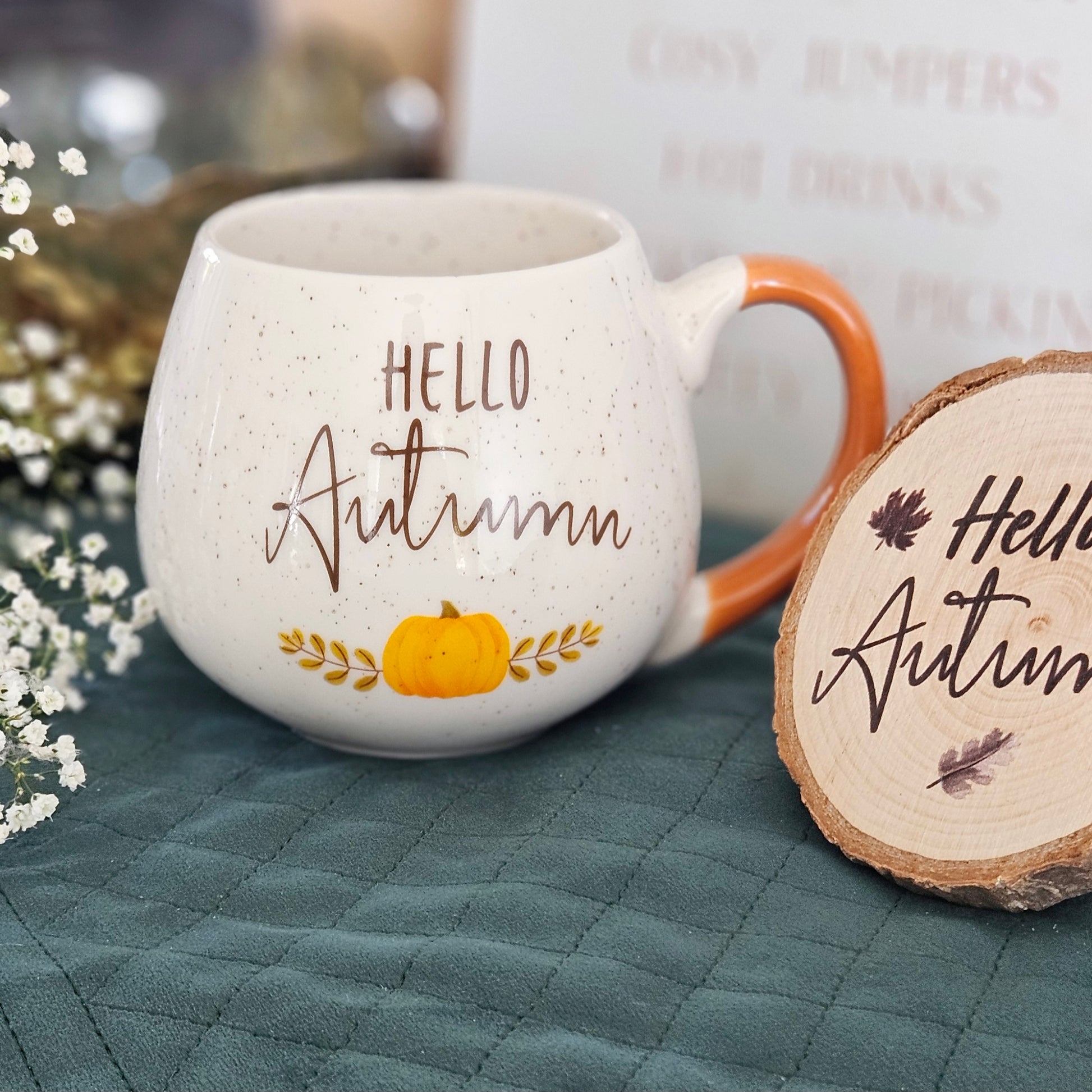 Hello Autumn round mug with wording and pumpkin print speckled detail finish and orange handle