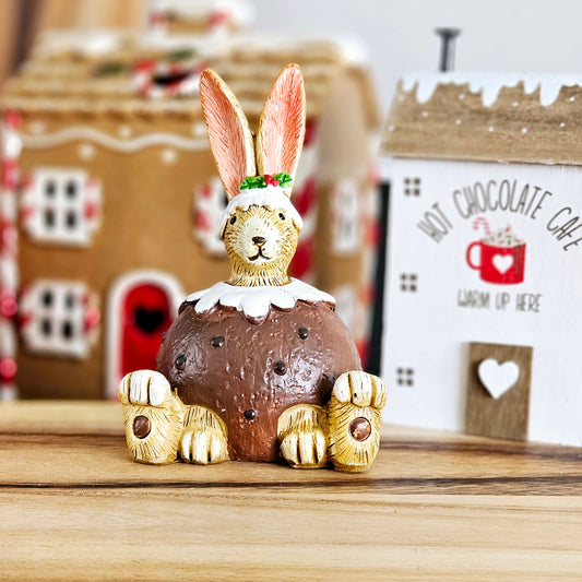 christmas pudding bunny sat inside a christmas pudding outfit  figurine