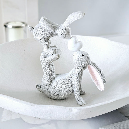 grey kissing mum and baby bunnies with a white heart kiss figurine