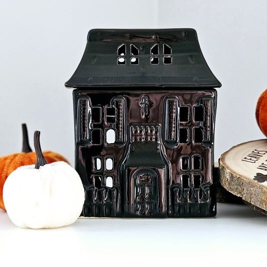 Black haunted house oil burner with removable lid