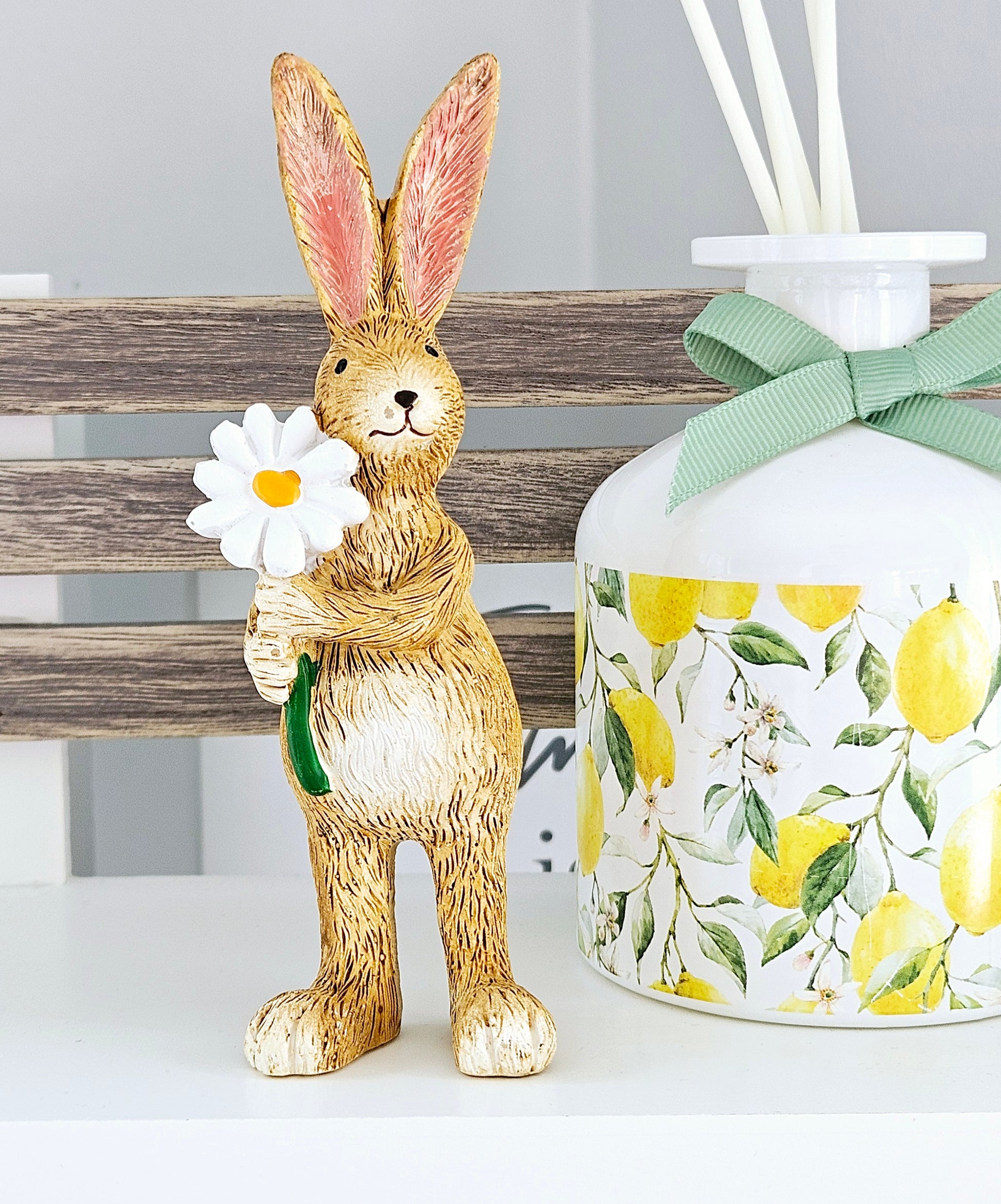 Daisy rabbit bunny figurine holding a daisy flower 