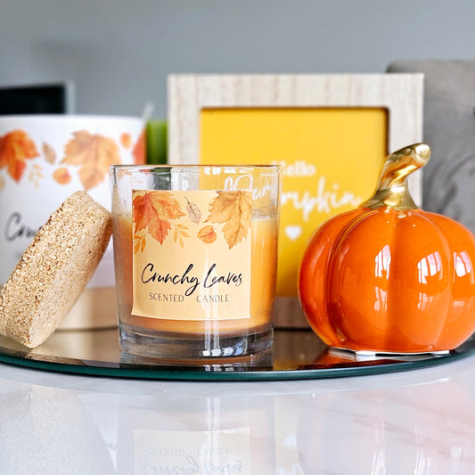 crunchy leaves autumn scented candle in glass pot and cork lid