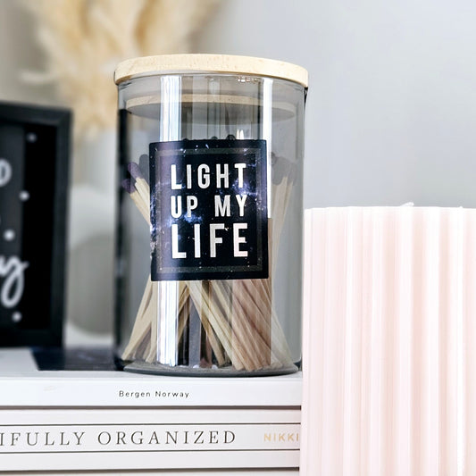 light up my life matches in a glass jar with wooden lid and purple tips