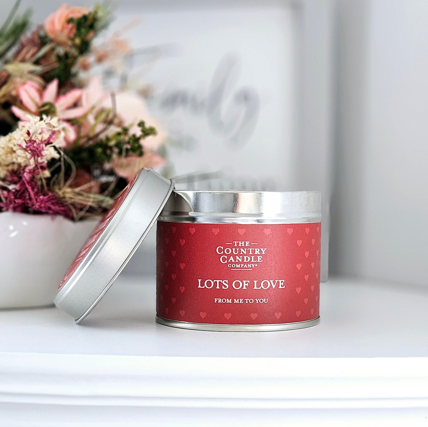 LOTS OF LOVE CANDLE IN A RED TIN BY THE COUNTRY CANDLE COMPNAY 