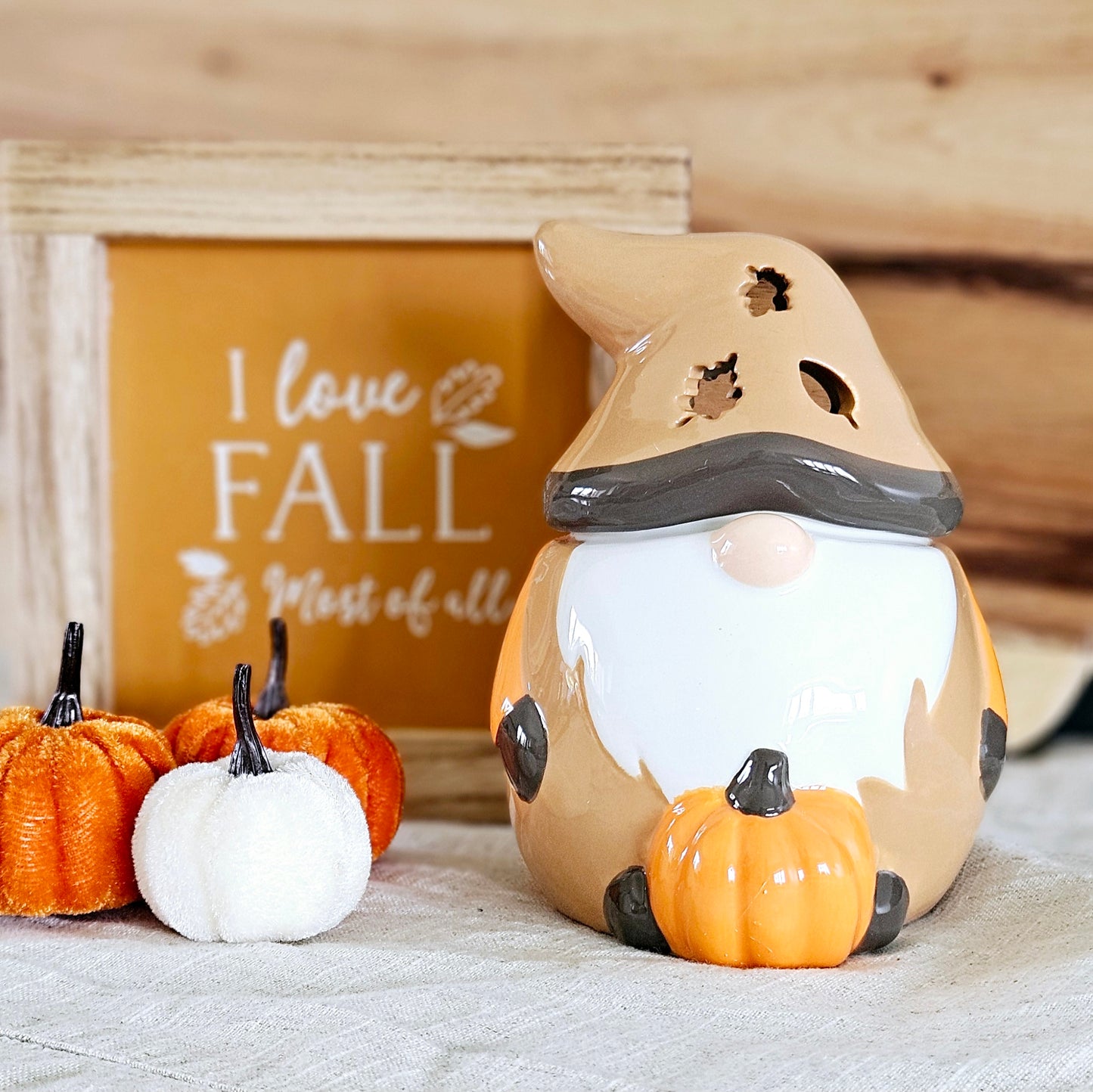 autumn gonk oil burner in brown and orange with a pumpkin