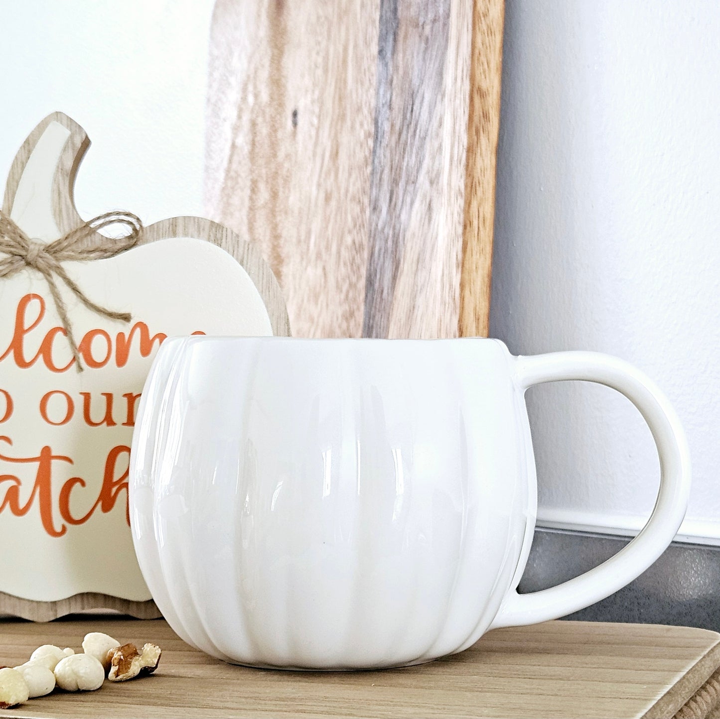 white ceramic pumpkin shaped mug 