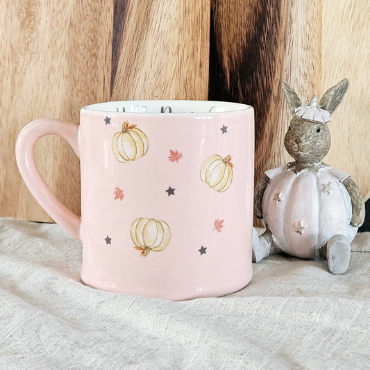 Pink hello pumpkin mug with pumpkins stars and leaves design nd hello pumpkin wording written inside