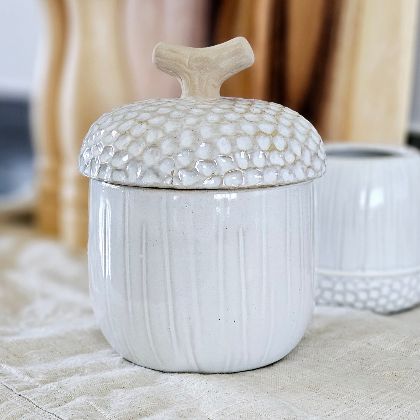 Large ceramic acorn storage jar with acorn branch lid