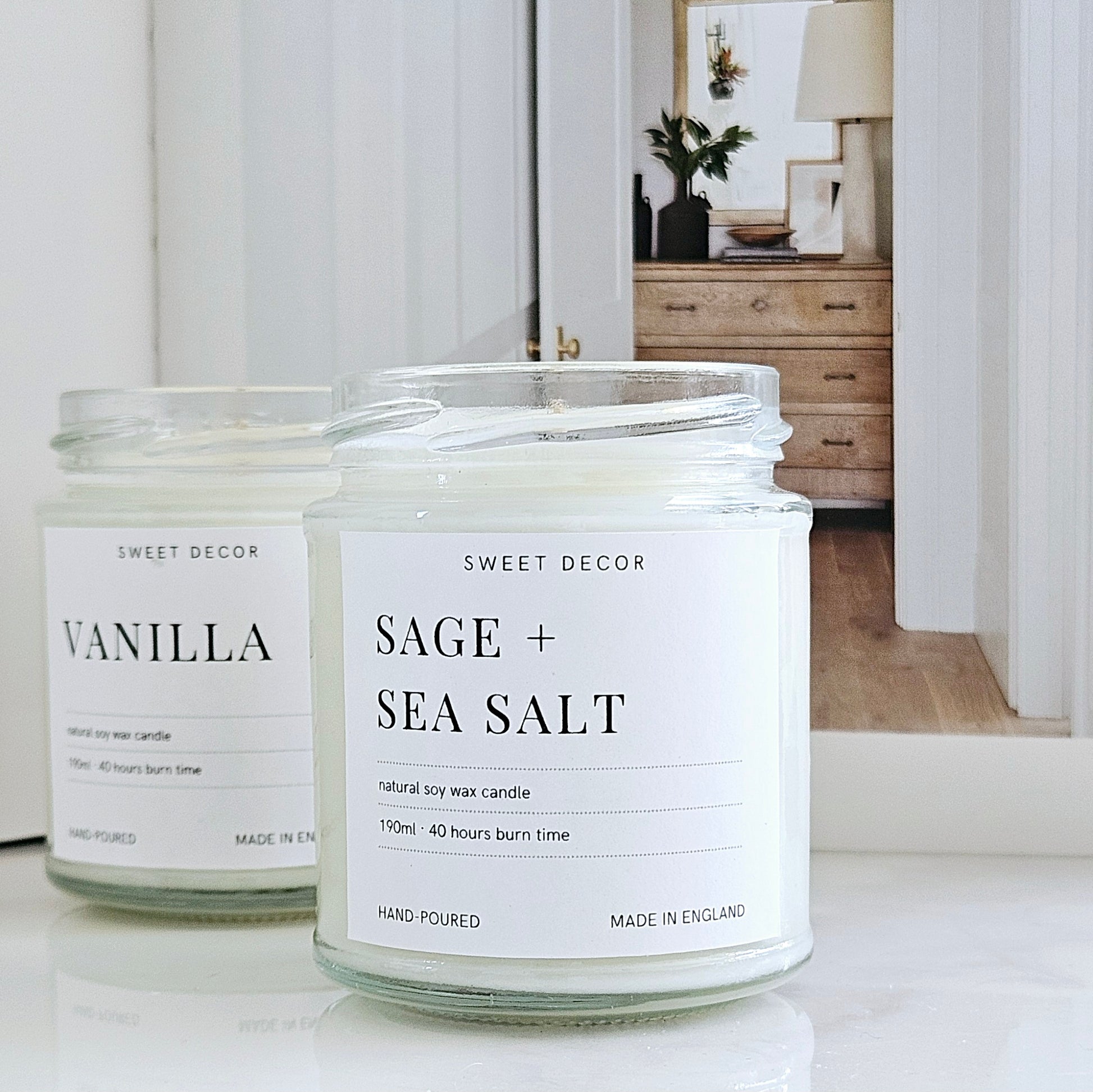 Sage + sea salt candle in a clear glass jar with label 10ml made in England hand poured sweet decor