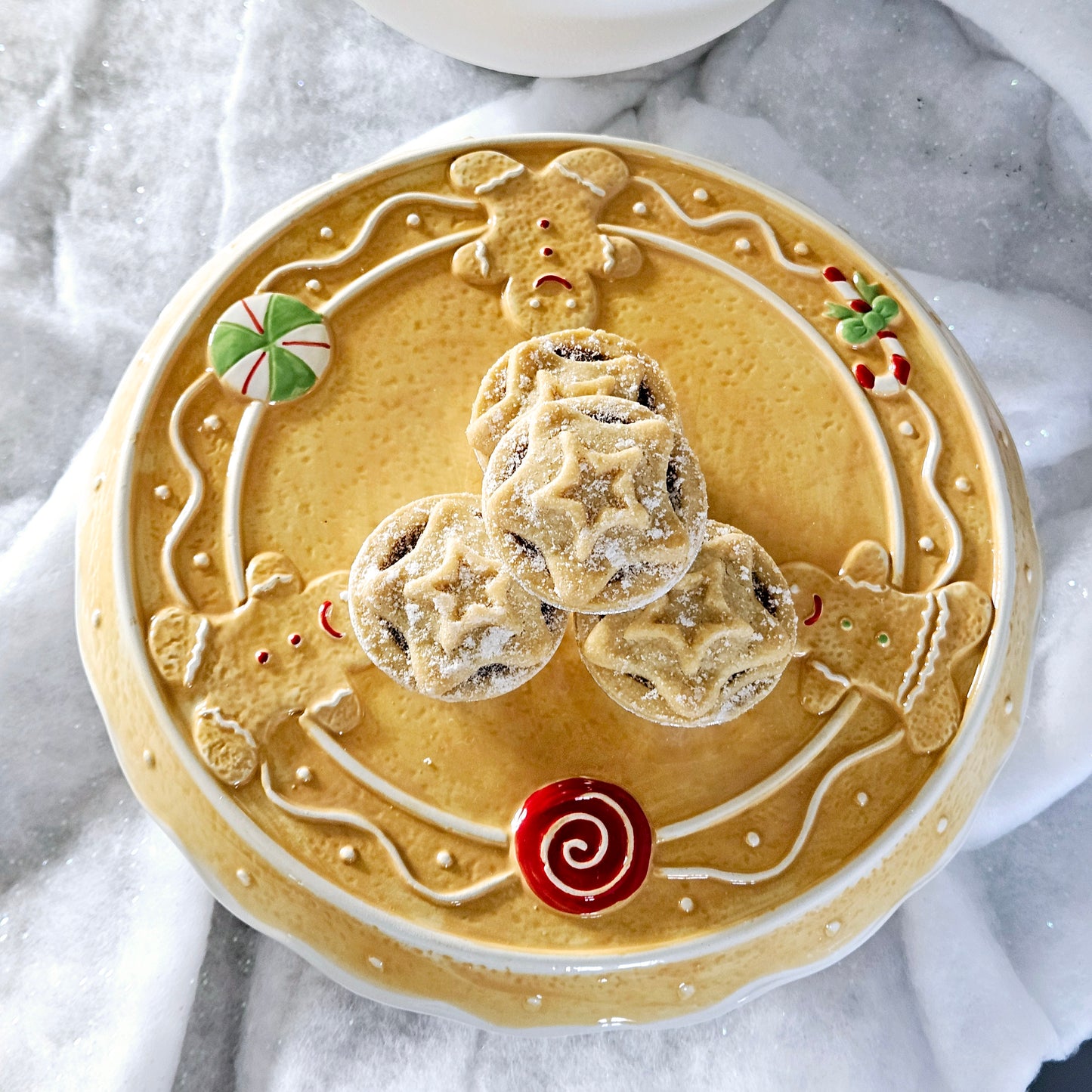 gingerbread ceramic decorative cake stand with candy canes and gingerbread men detail 