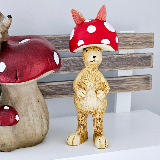 jasper rabbit wearing a red and white mushroom hat ornament