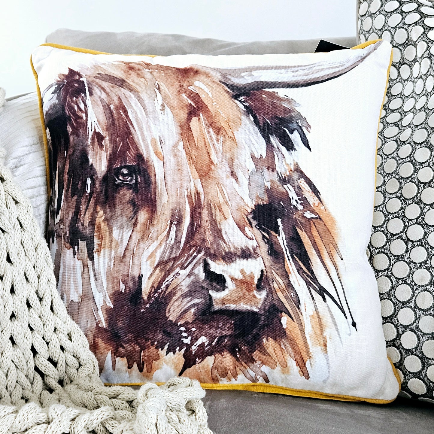 meg hawkins square highland cow cushion with buttons on the back