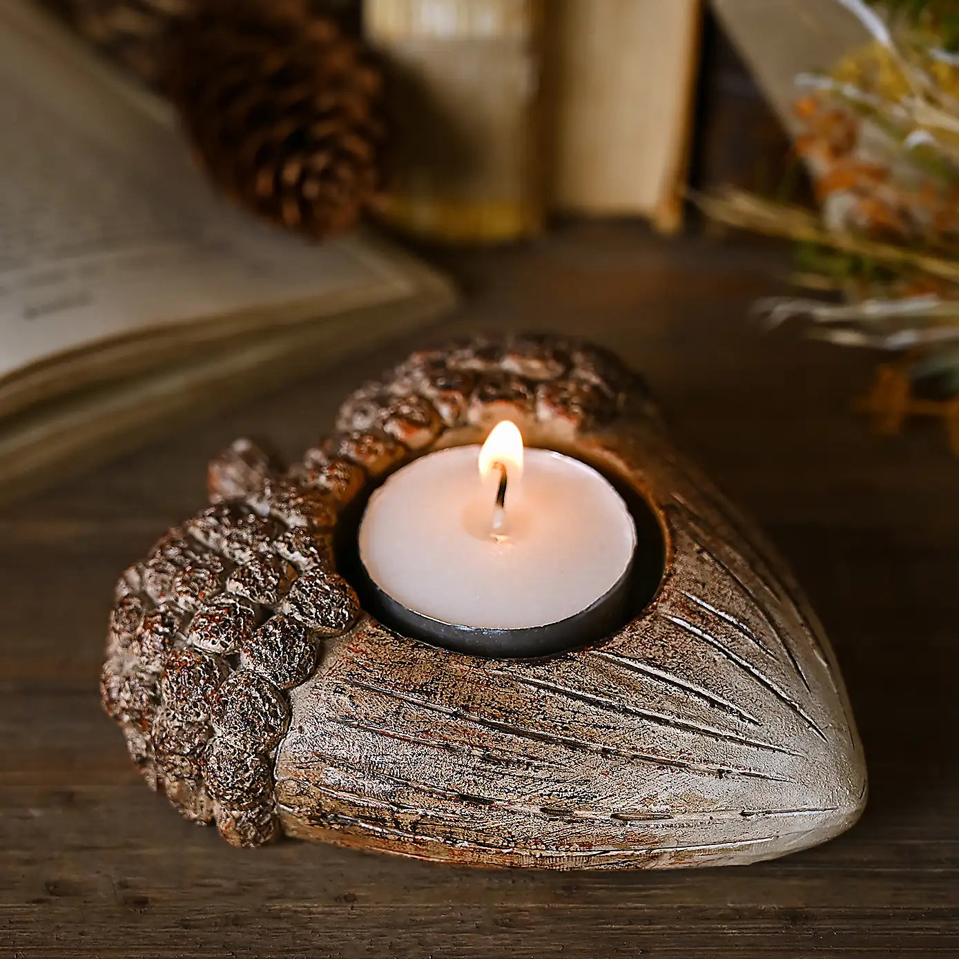 heart shaped acorn tea light holder made from resin 