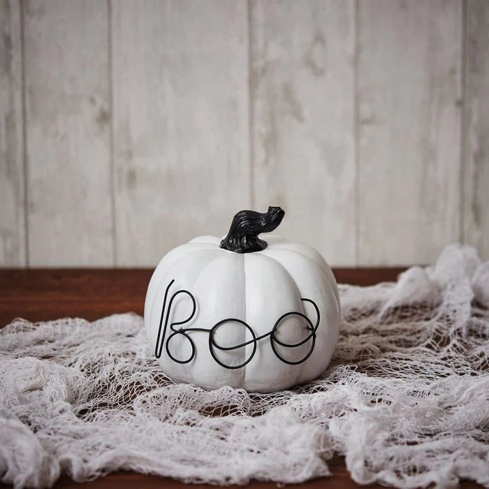 Black & White Boo Pumpkin Ornament for Halloween home décor displayed on a shelf as a stylish seasonal decoration